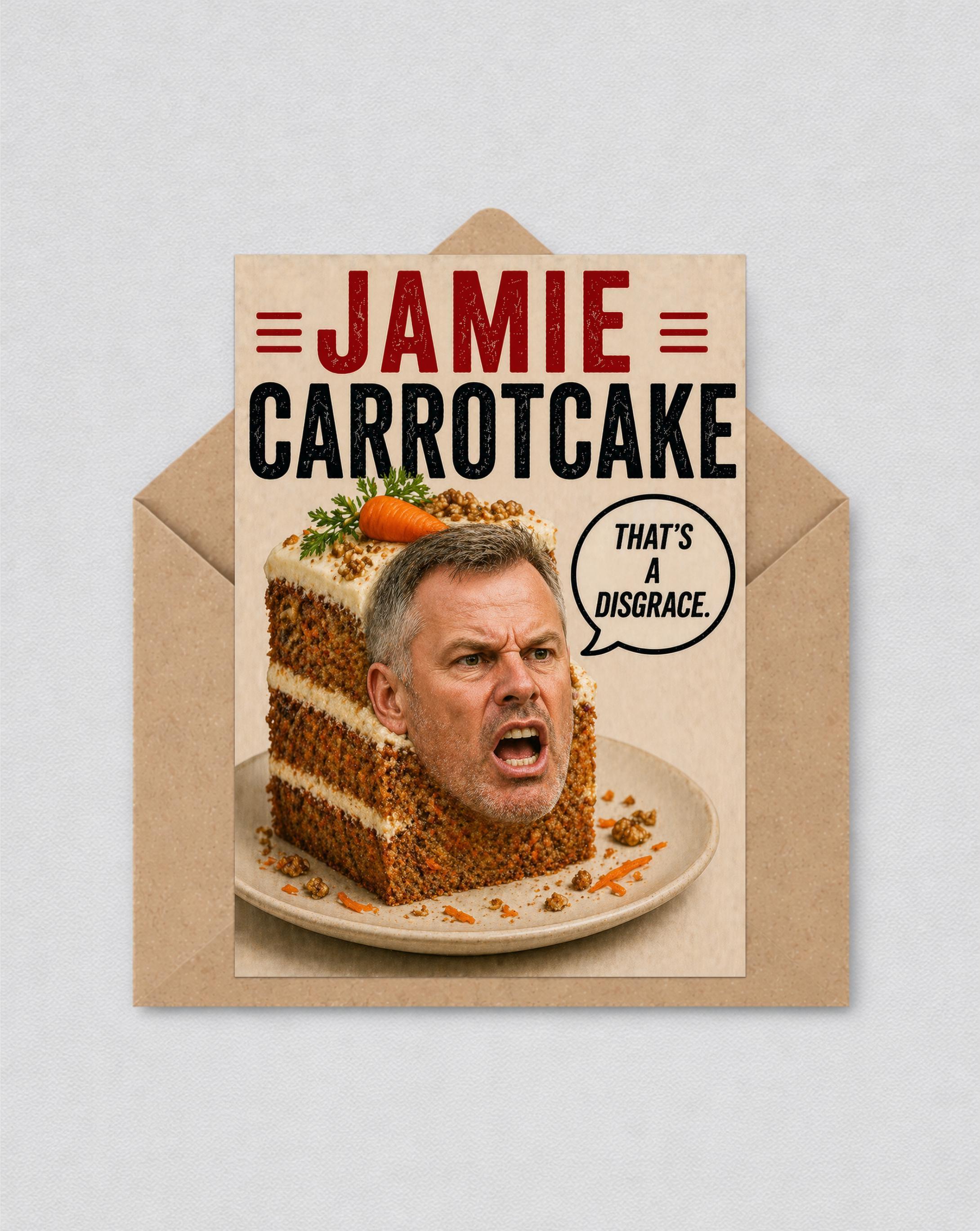 May include: A novelty greeting card with the words "JAMIE CARROTCAKE" in red and black. The image shows a man's face in a slice of carrot cake, with a speech bubble saying "THAT'S A DISGRACE."