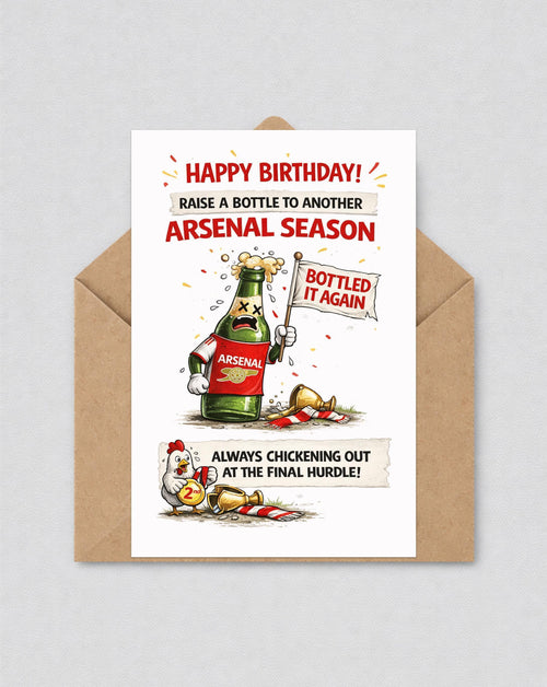 May include: A birthday card with a cartoon beer bottle wearing an Arsenal shirt, holding a flag that says "Bottled It Again." The card has text that reads "Happy Birthday!" and "Always chickening out at the final hurdle!" in red.