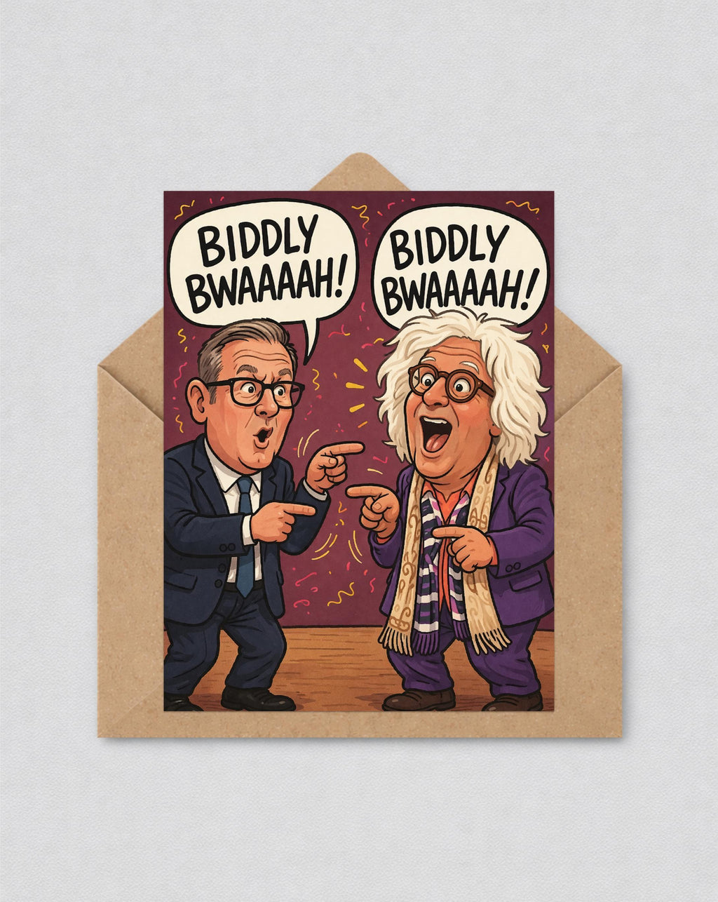 May include: A humorous greeting card with a cartoon illustration of two men laughing and pointing. Speech bubbles above them say "Biddly Bwaaaah!". The card is set against a burgundy background and is inside a brown envelope.