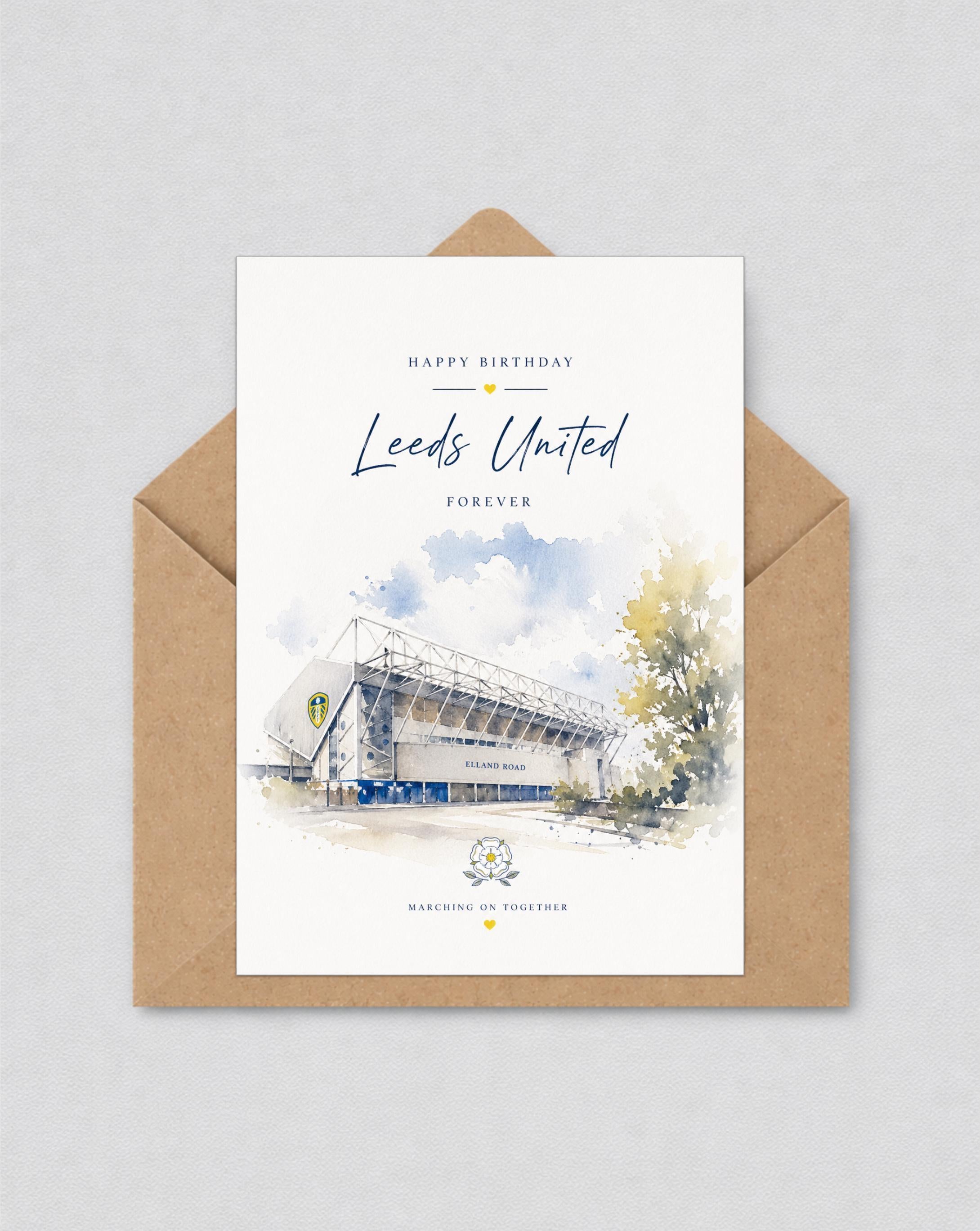 May include: A birthday card with a watercolour illustration of the Leeds United stadium, with the text "Happy Birthday Leeds United Forever." The card is in a brown envelope. The stadium is shown in white and blue.
