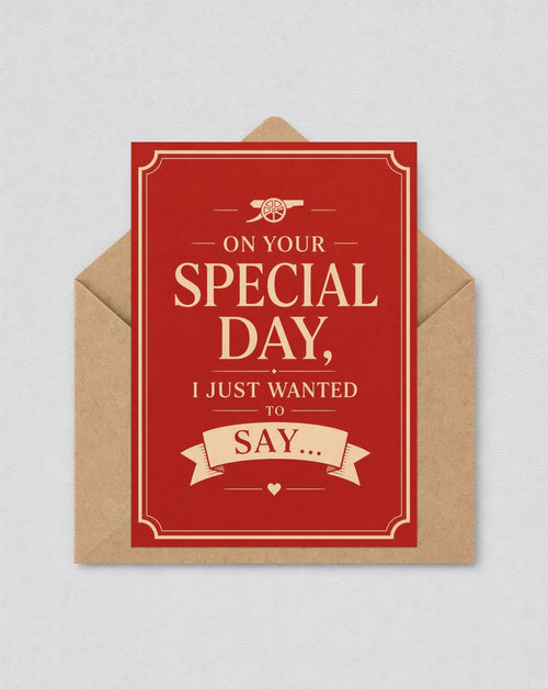 May include: A red greeting card with the text "ON YOUR SPECIAL DAY, I JUST WANTED TO SAY..." in a cream-colored font. The card is inside a brown envelope. The card has a decorative border and a small cannon icon.